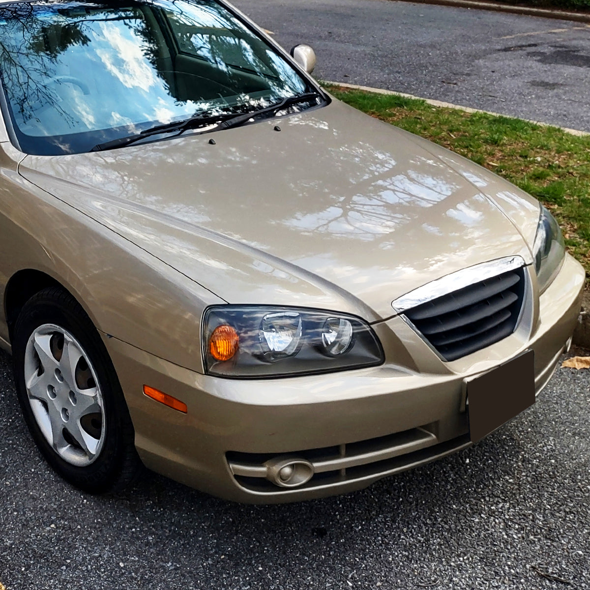 2004-2006 Hyundai Elantra Crystal Headlights w/ Amber Reflectors (Black Housing/Clear Lens)