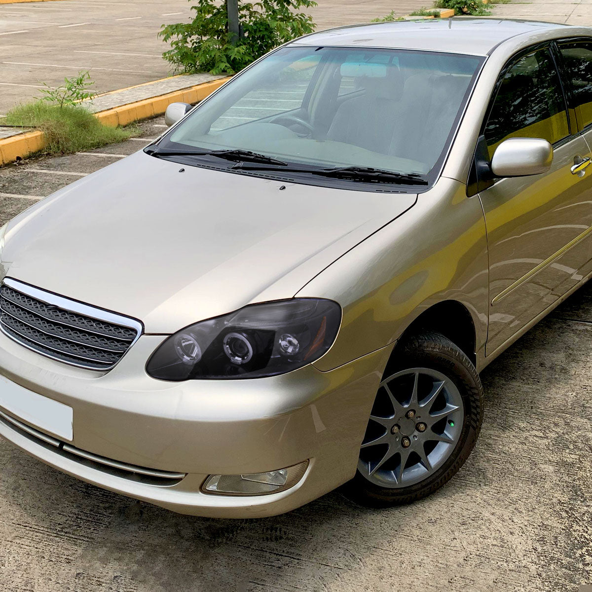 2003-2008 Toyota Corolla Dual Halo Projector Headlights (Glossy Black Housing/Smoked Lens)
