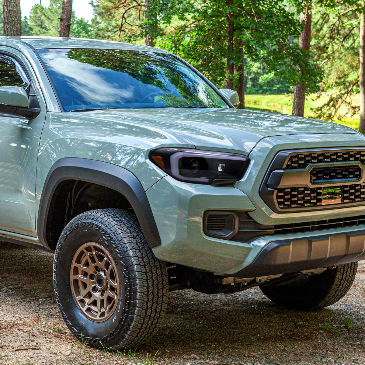 2016-2023 Toyota Tacoma Switchback LED C-Bar Projector Headlights (Glossy Black Housing/Smoked Lens)