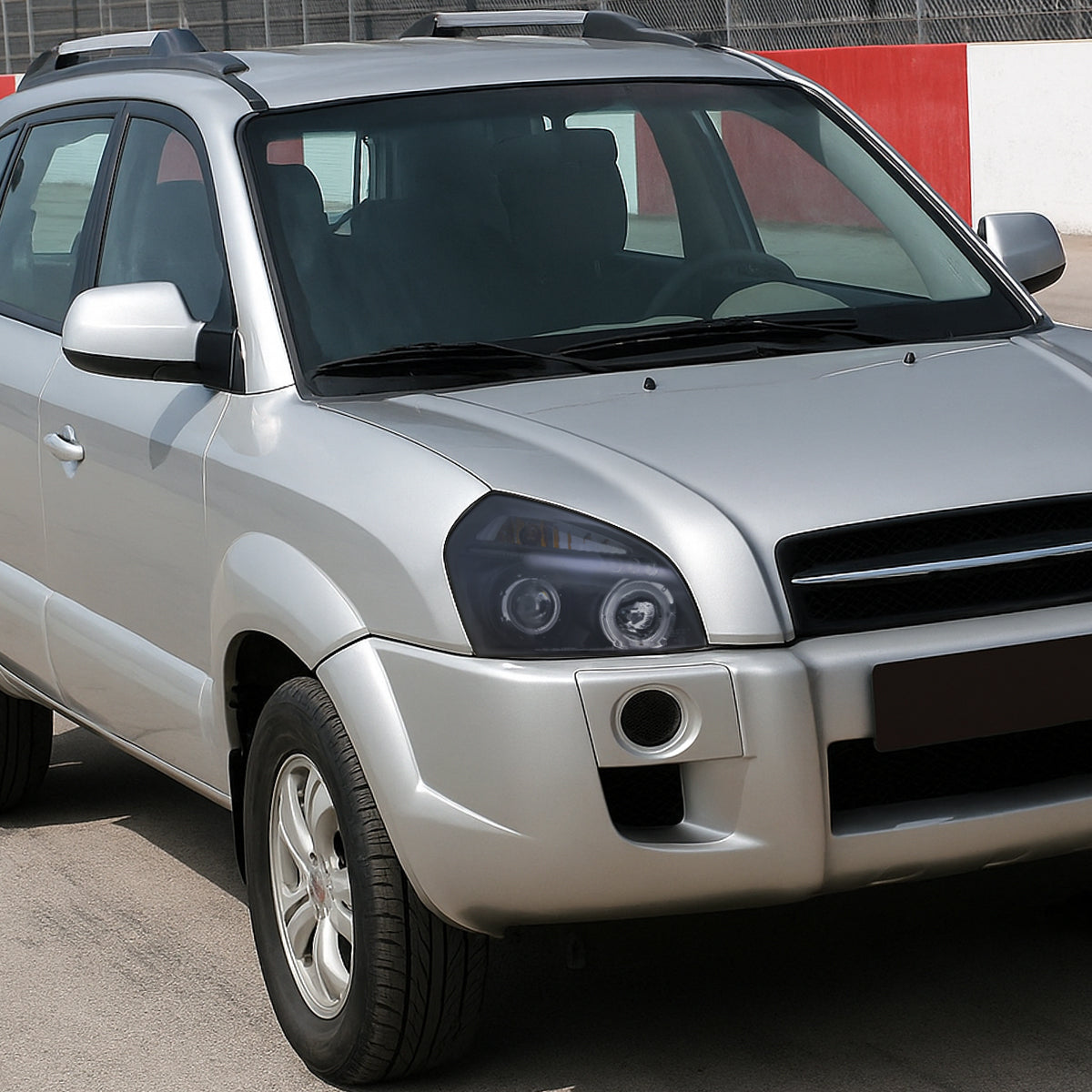 2005-2009 Hyundai Tucson Single Halo Projector Headlights (Matte Black Housing/Clear Lens)