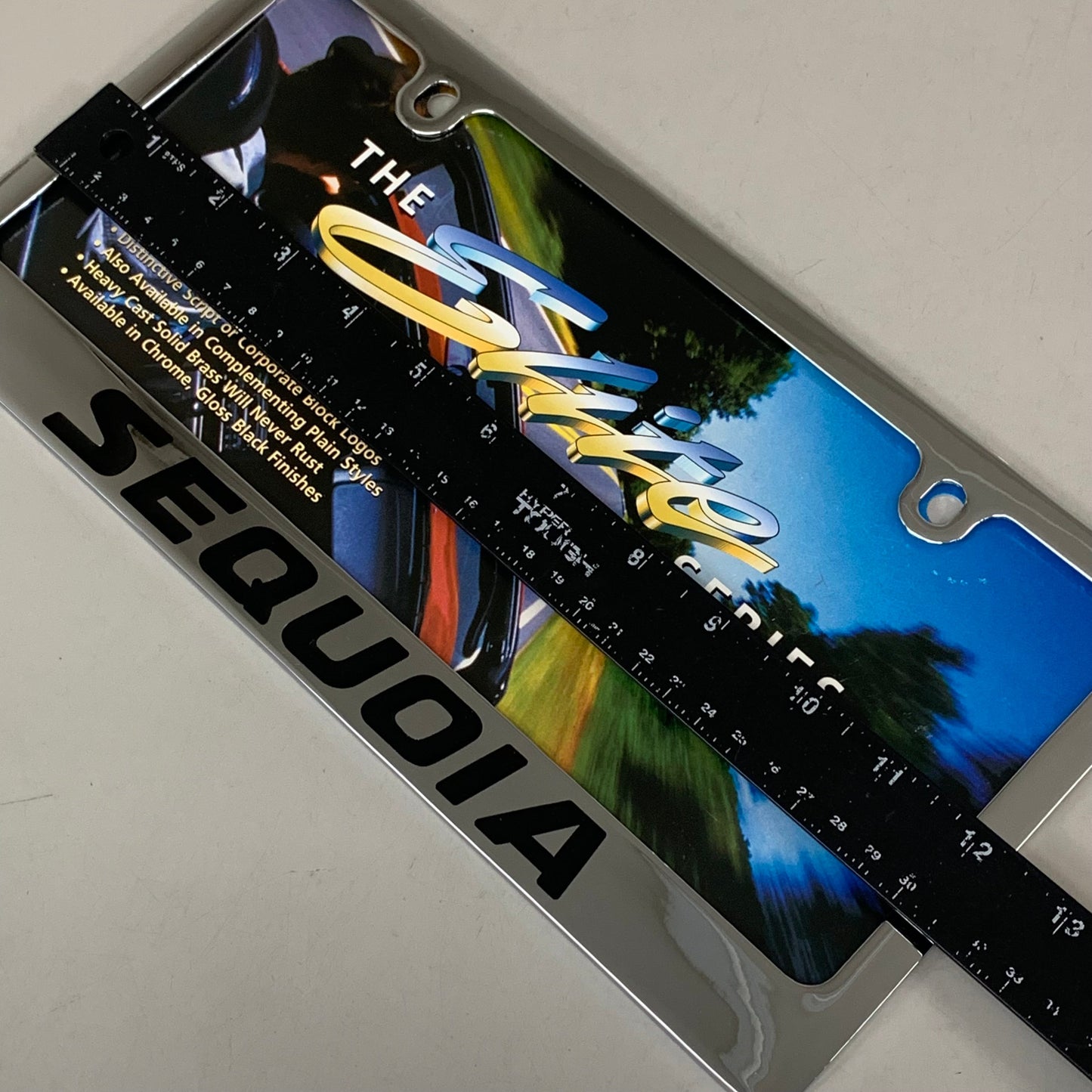 ELITE AUTOMOTIVE PRODUCTS Sequia Emblem Solid Brass License Plate Frame Chrome