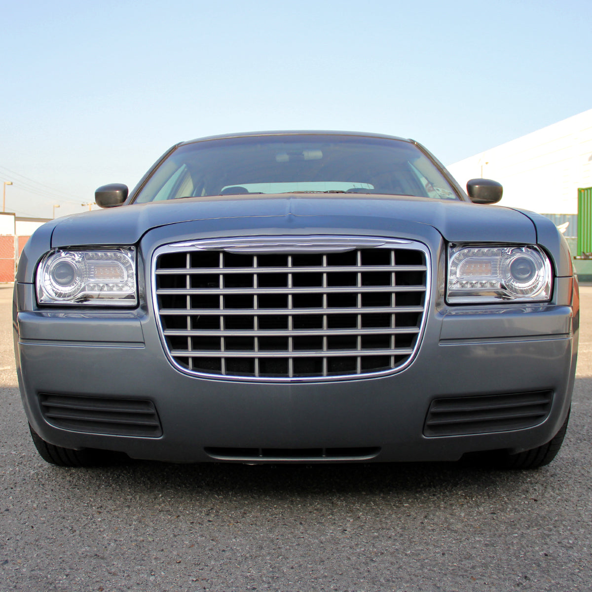 2005-2010 Chrysler 300 Base/LX/Touring Projector Headlights w/ LED Light Strip & LED Turn Signal Lights (Chrome Housing/Clear Lens)