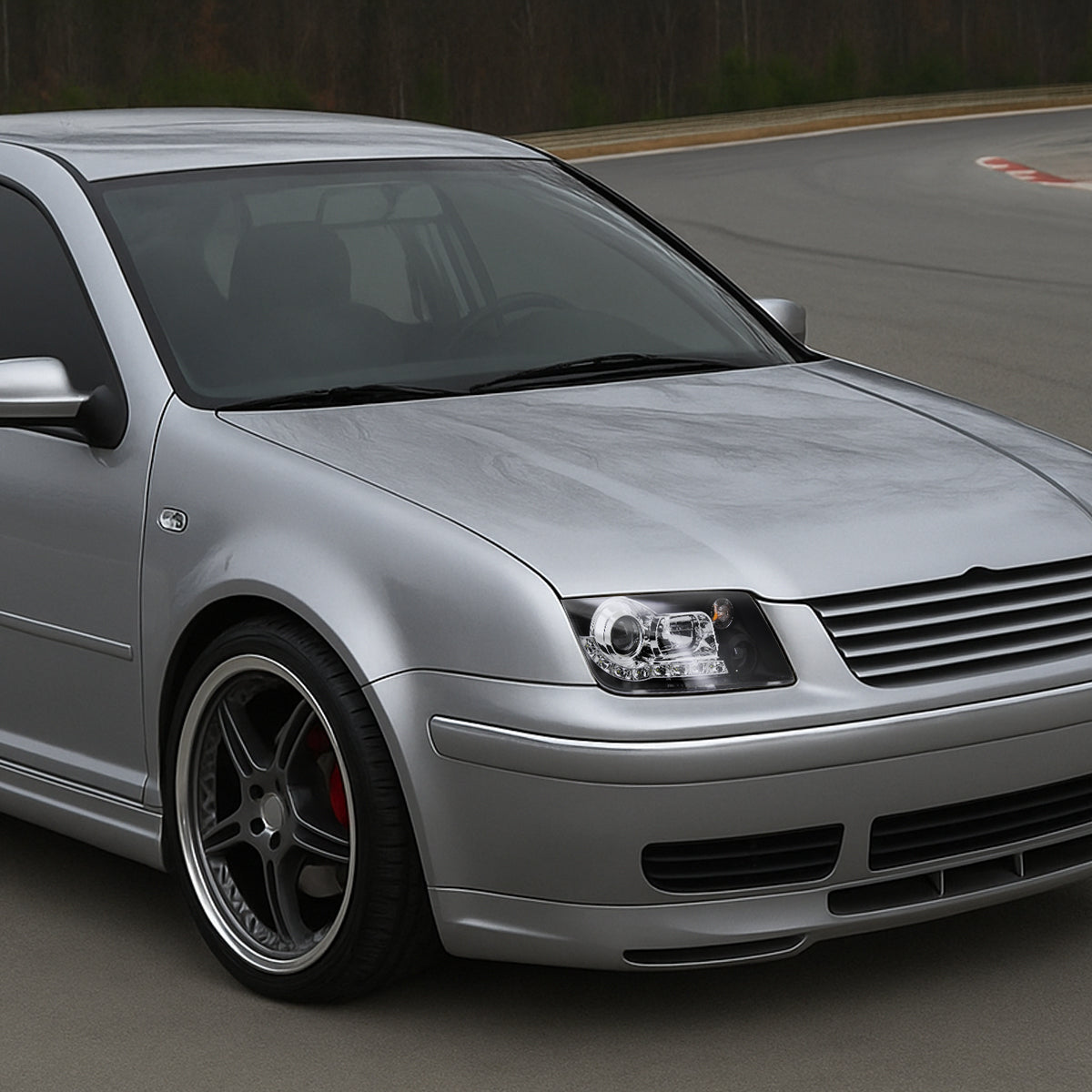 1999-2004 Volkswagen Jetta/Bora Projector Headlights w/ R8 Style LED Light Strip (Matte Black Housing/Clear Lens)