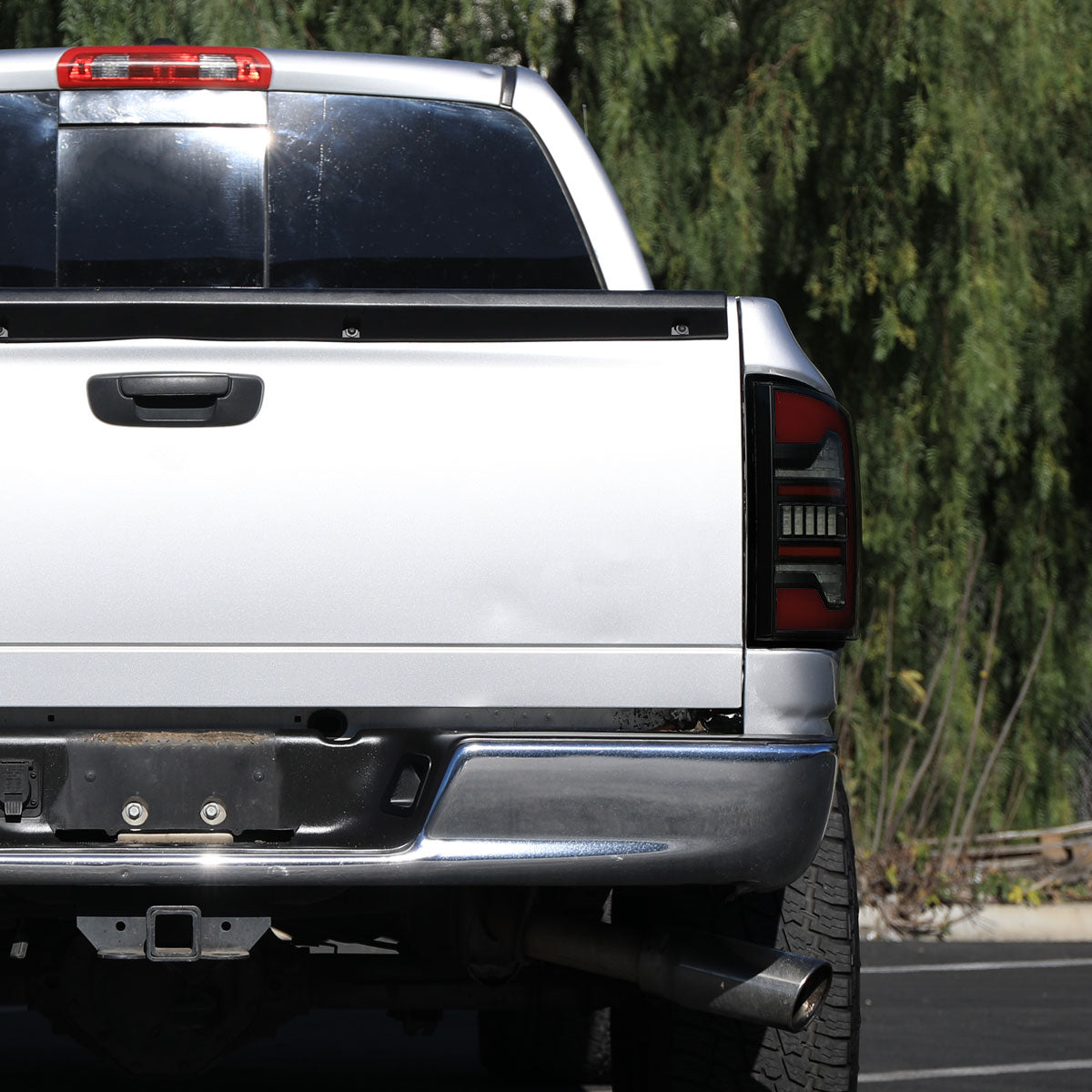 2007-2009 Dodge RAM 1500/2500/3500 Red LED Bar Tail Lights (Matte Black Housing/Smoked Lens)
