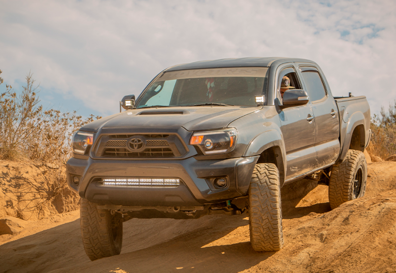Cali Raised LED Cali Raised 05-15 Toyota Tacoma Low Prof Ditch Light Brackets Kit W/ Blue Backlight - Small CR2862
