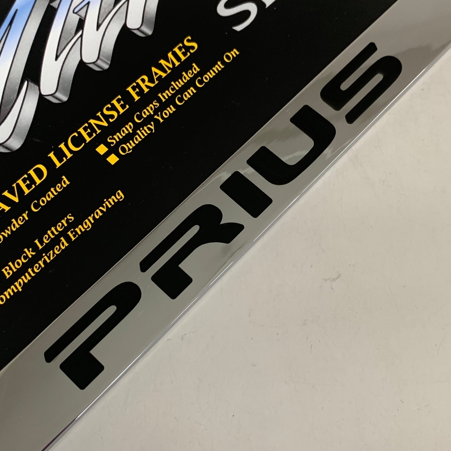 ELITE AUTOMOTIVE PRODUCTS Pruis Emblem Solid Brass License Plate Frame Chrome