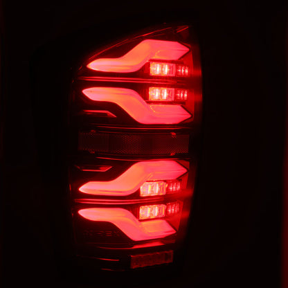 AlphaRex 16-21 Toyota Tacoma LUXX LED Taillights Blk/Red w/Activ Light/Seq Signal 680000 *Discontinued