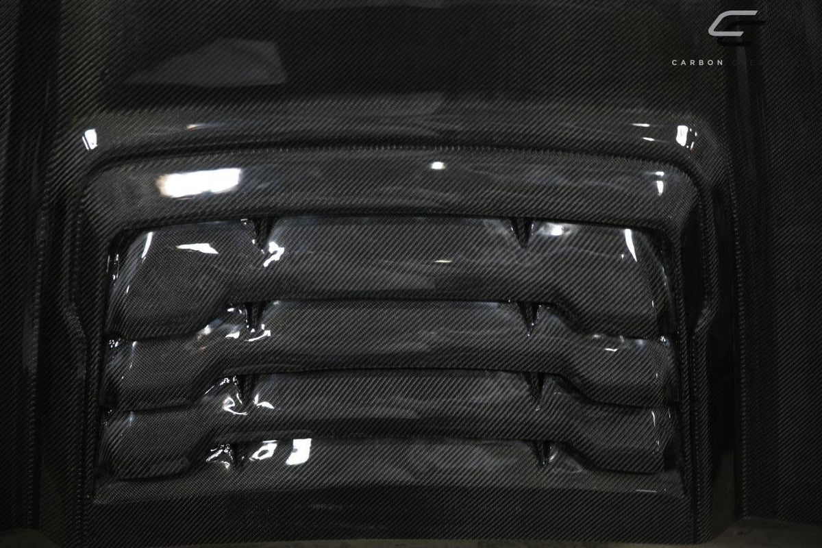 1999-2007 Ford Super Duty Carbon Creations Raptor Look Carbon Fiber Hood