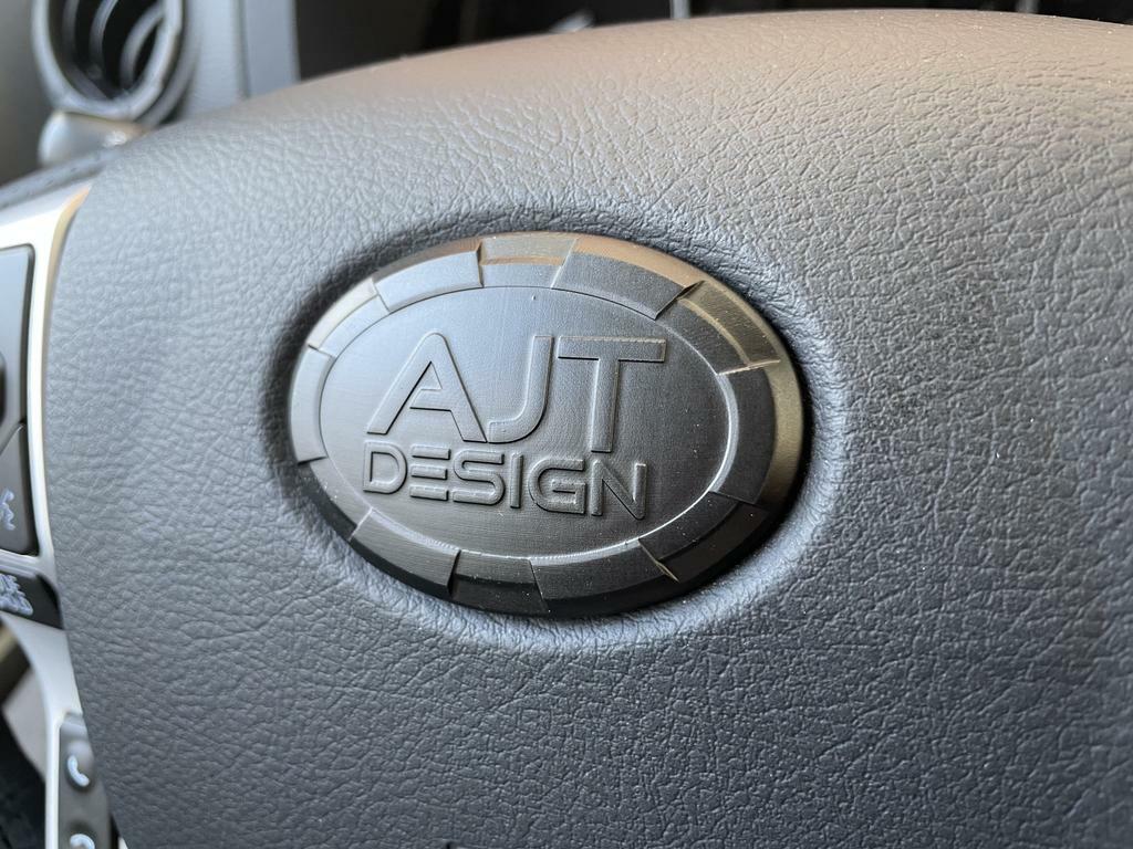 Steering Wheel Emblem Overlay (Select Toyota Models) - BLACK - AJT DESIGN