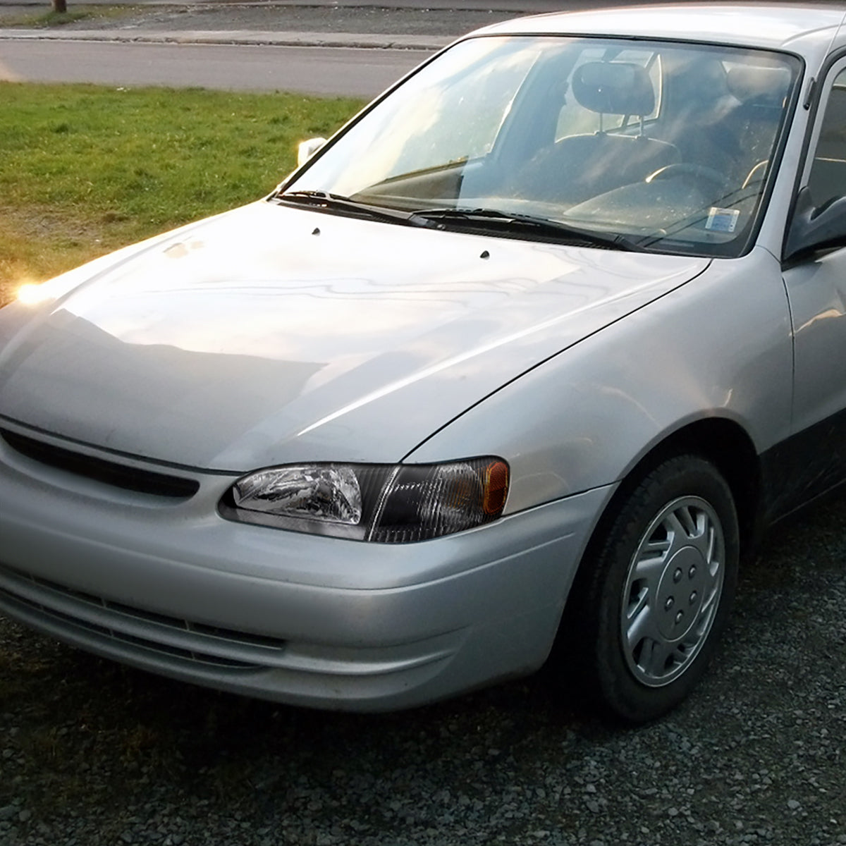 1998-2000 Toyota Corolla Factory Style Crystal Headlights w/ Corner Lights & Bulbs (Matte Black Housing/Clear Lens)