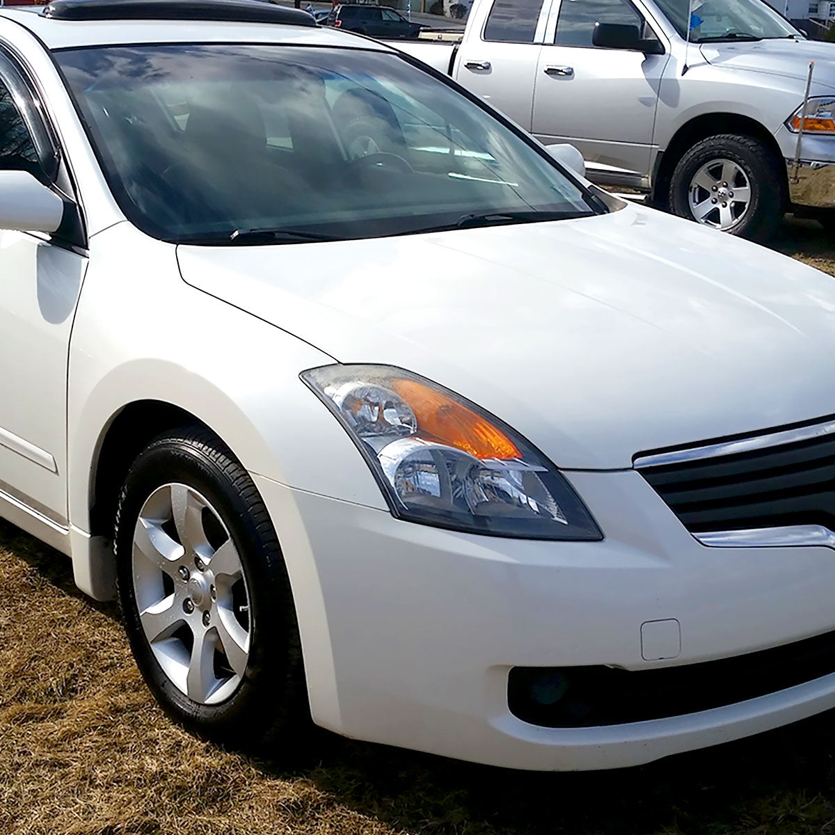 2007-2009 Nissan Altima Sedan Crystal Headlights w/ Amber Reflector (Matte Black Housing/Clear Lens)