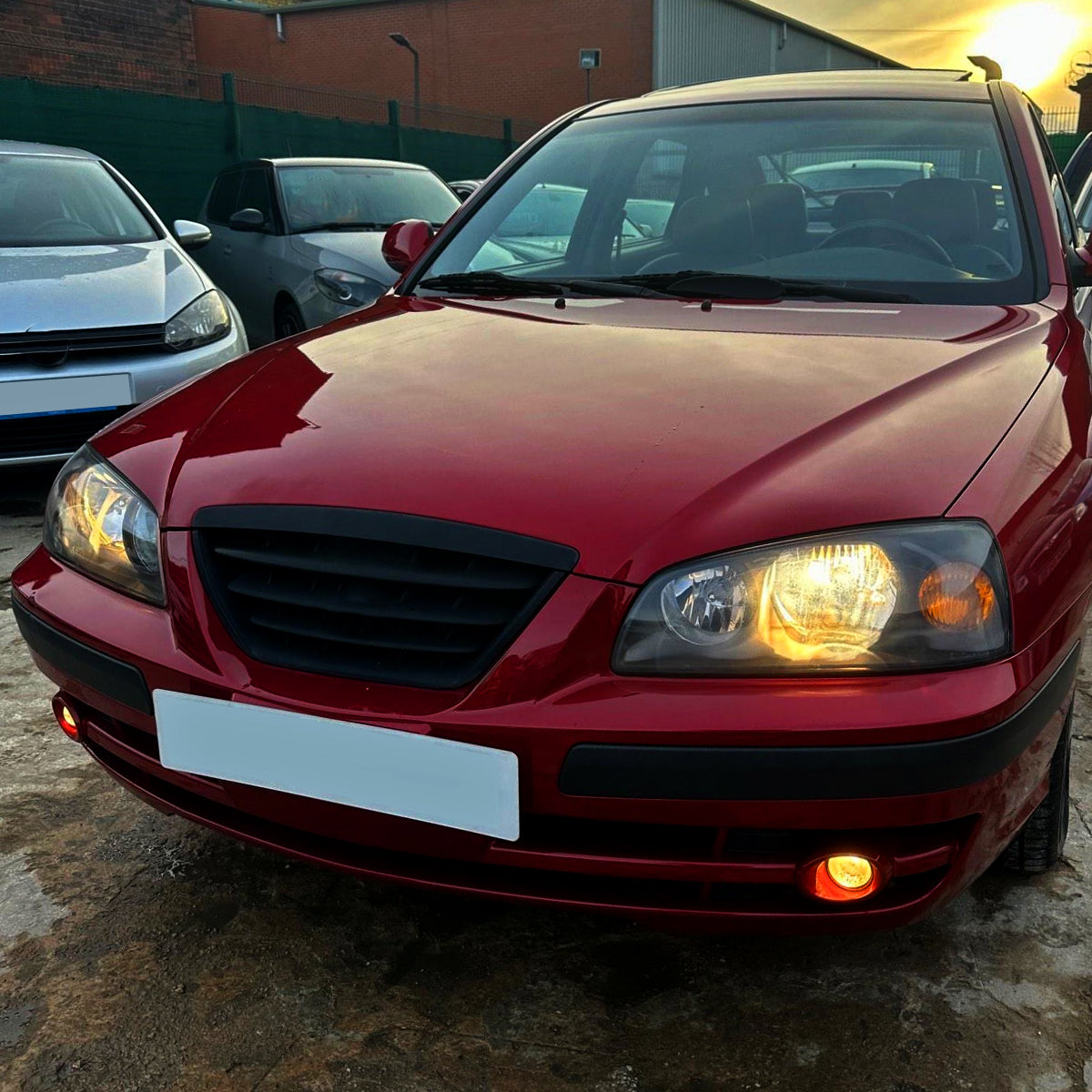 2004-2006 Hyundai Elantra Crystal Headlights w/ Amber Reflectors (Black Housing/Clear Lens)