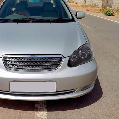 2003-2008 Toyota Corolla Dual Halo Projector Headlights (Glossy Black Housing/Smoked Lens)