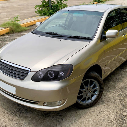 2003-2008 Toyota Corolla Dual Halo Projector Headlights (Glossy Black Housing/Smoked Lens)