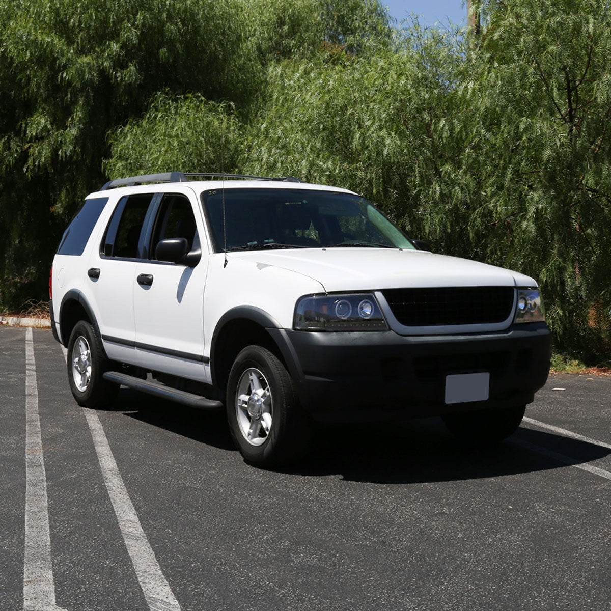 2002-2005 Ford Explorer Dual Halo Projector Headlights w/ LED Light Strip (Jet Black Housing/Clear Lens)