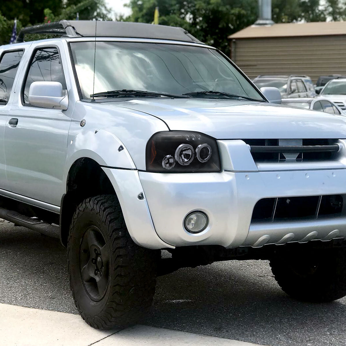 2001-2004 Nissan Frontier Dual Halo Projector Headlights (Glossy Black Housing/Smoked Lens)