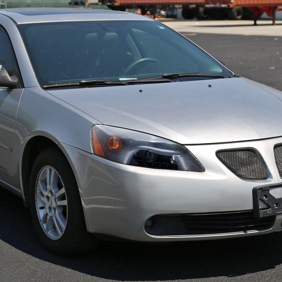 2005-2010 Pontiac G6 Projector Headlights w/ LED Light Strip (Matte Black Housing/Clear Lens)