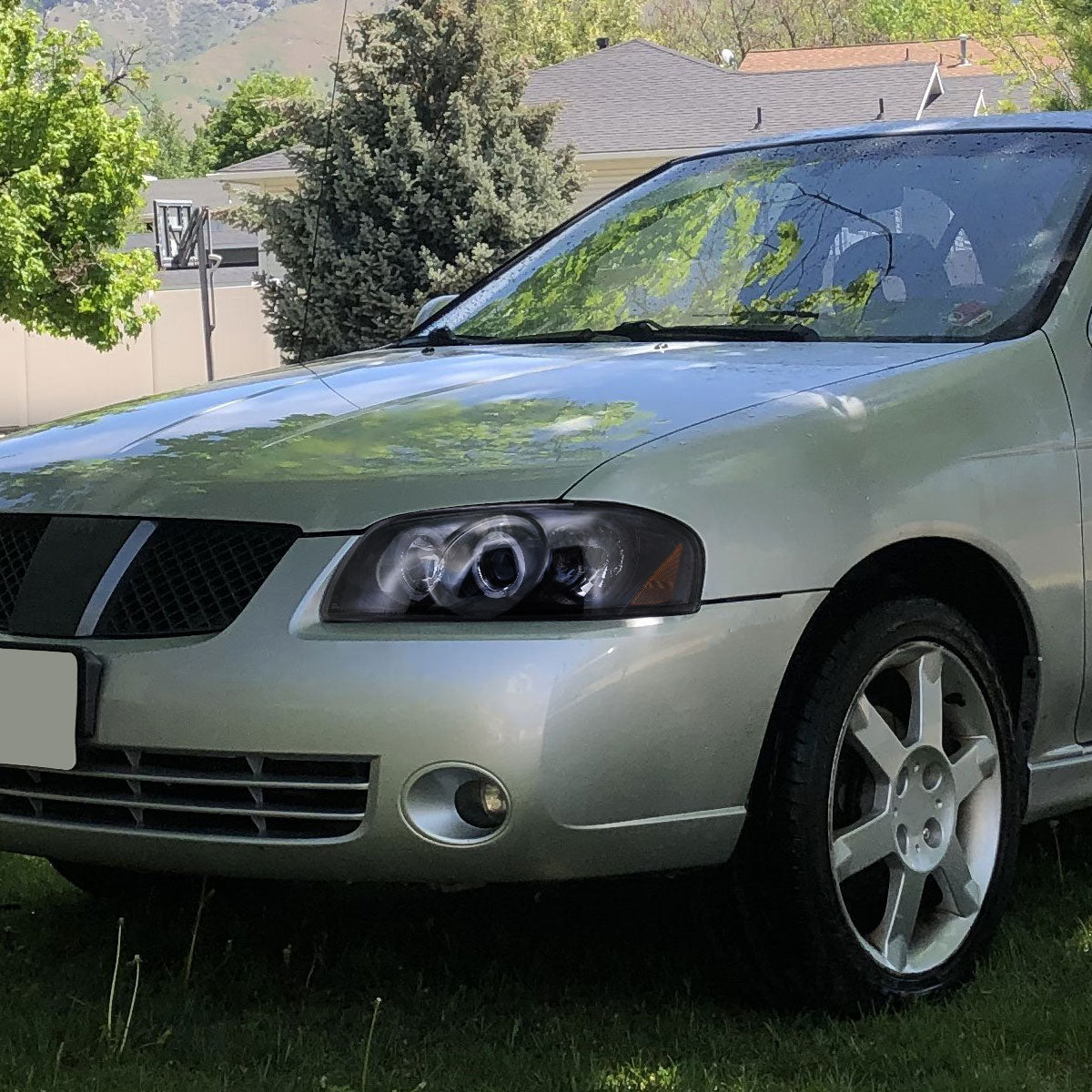 2004-2006 Nissan Sentra Dual Halo Projector Headlights (Glossy Black Housing/Smoked Lens)