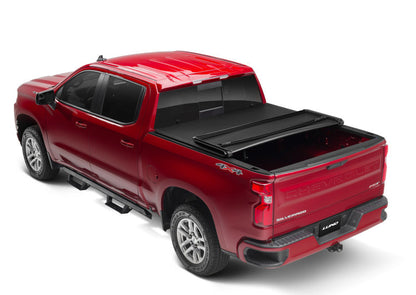 Lund 07-14 Sierra Silverado 2500/3500 (6.5ft. Bed) Genesis Tri-Fold Tonneau Cover - Black