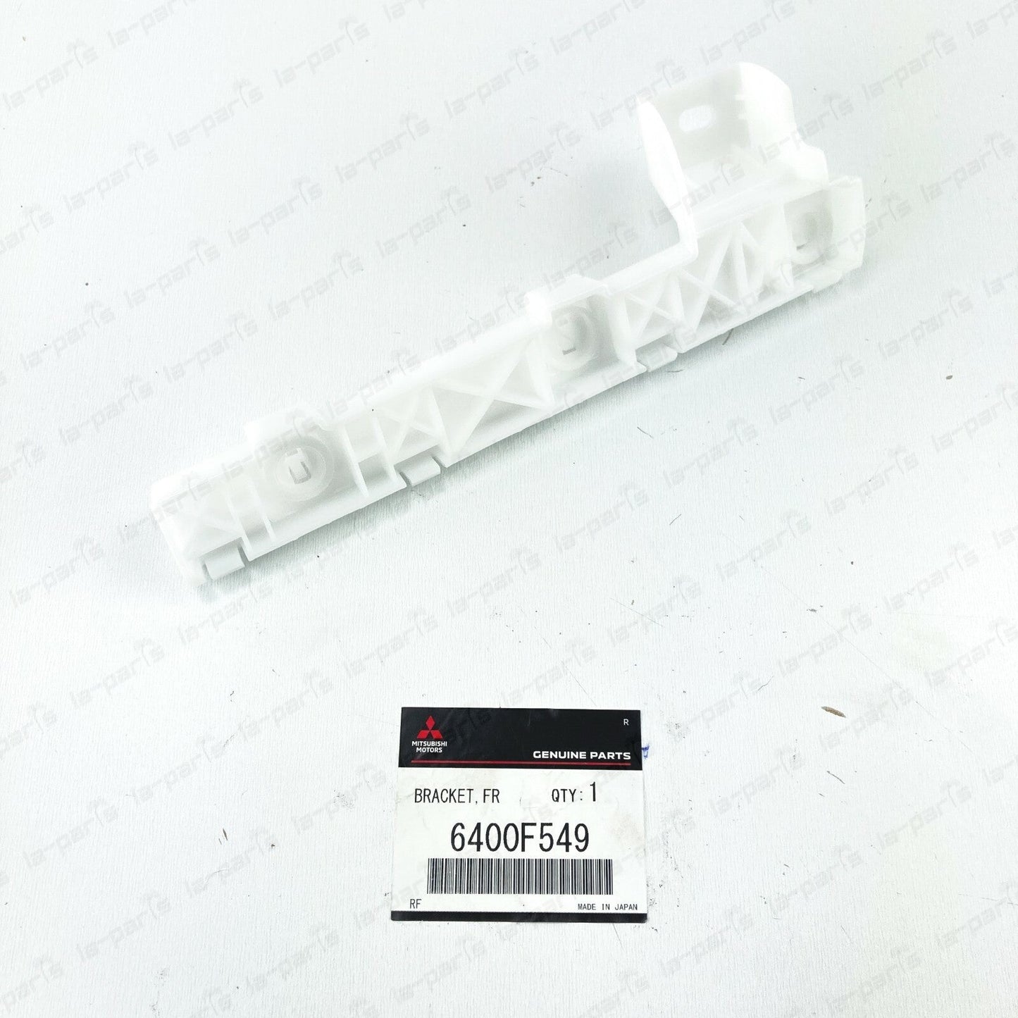NEW GENUINE MITSUBISHI LANCER LEFT DRIVER SIDE  FRONT BUMPER BRACKET 6400F549