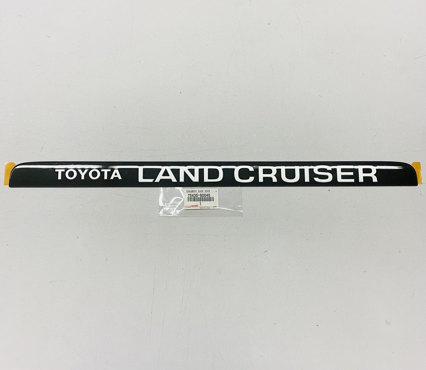 NEW GENUINE TOYOTA 91-97 LAND CRUISER FJ80 FZJ8 REAR LIFTGATE ORNAMENT