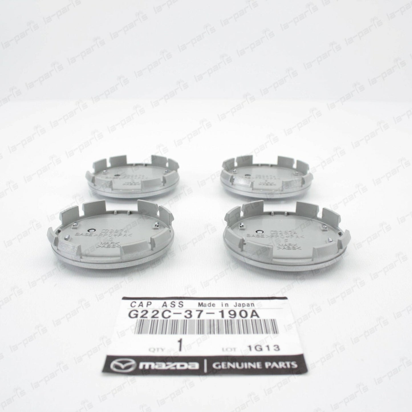SET OF 4 NEW GENUINE MAZDA CENTER  WHEEL CAP G22C-37-190A