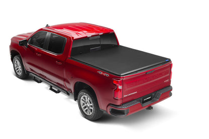 Lund 07-14 Sierra Silverado 2500/3500 (6.5ft. Bed) Genesis Tri-Fold Tonneau Cover - Black