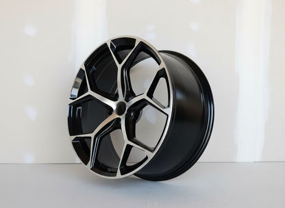 AU16 22x10 5x112 +20 66.6 Black Machined Face