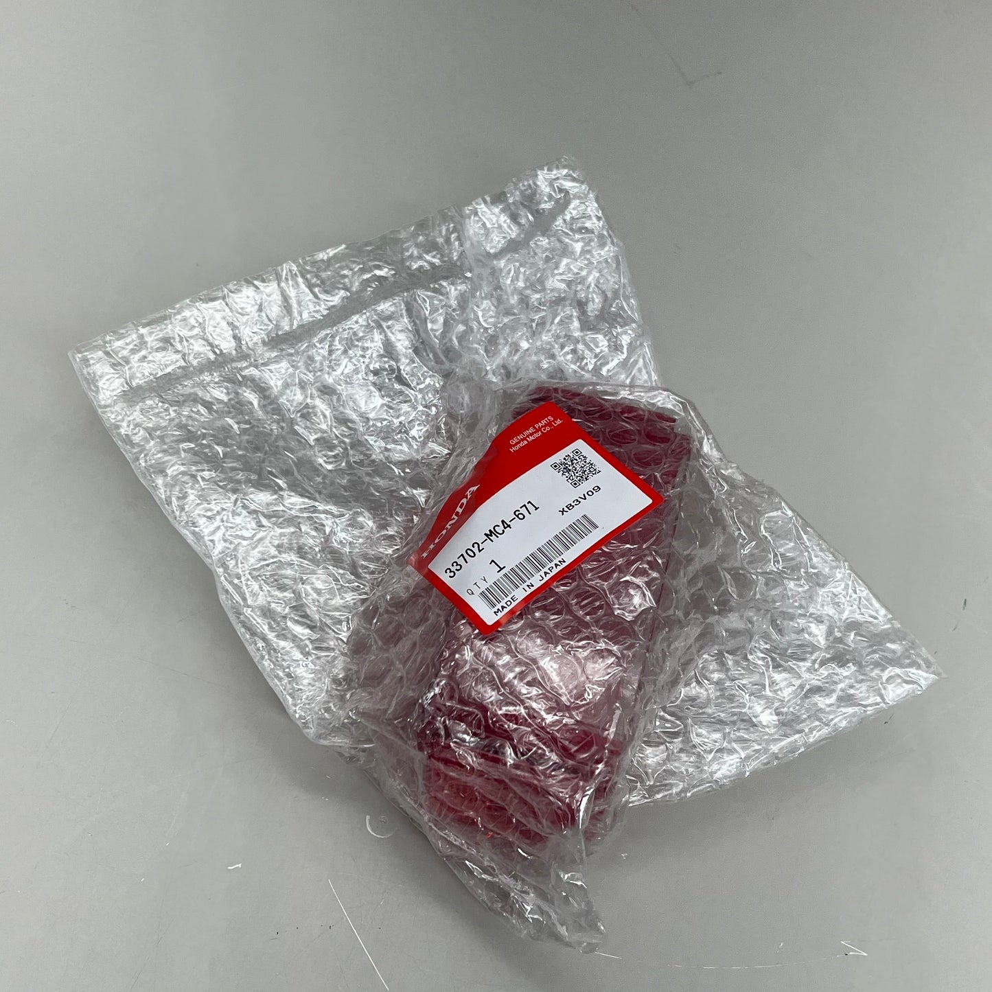HONDA Tail Light Lens CRF230L Magna 750 Rebel 300 Genuine OEM Red 33702-MC4-671