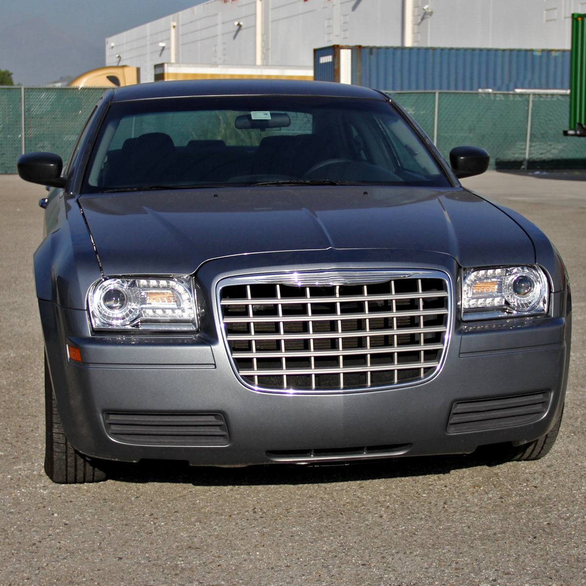 2005-2010 Chrysler 300 Base/LX/Touring Projector Headlights w/ LED Light Strip & LED Turn Signal Lights (Chrome Housing/Clear Lens)