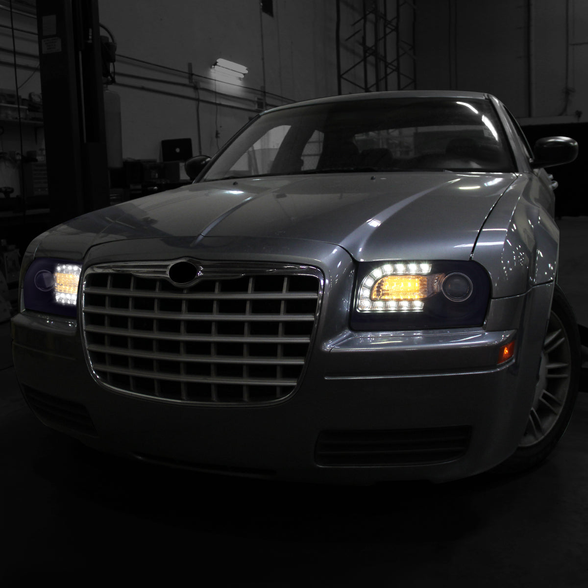 2005-2010 Chrysler 300 Base/LX/Touring Projector Headlights w/ LED Light Strip & LED Turn Signal Lights (Glossy Black Housing/Smoked Lens)