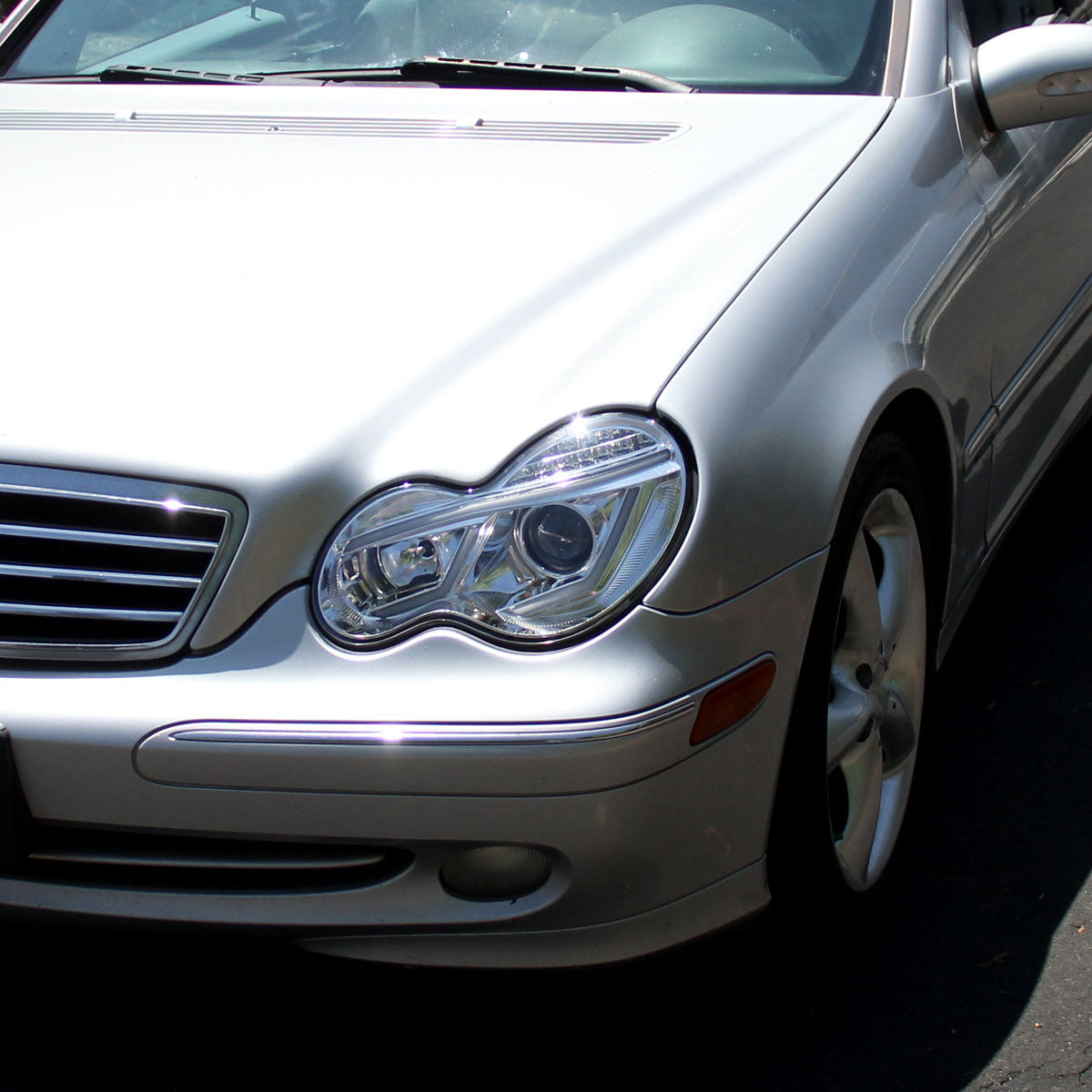 2001-2007 Mercedes Benz W203 C Class Sedan Projector Headlights w/ LED Light Bar & LED Turn Signal Lights (Chrome Housing/Clear Lens)