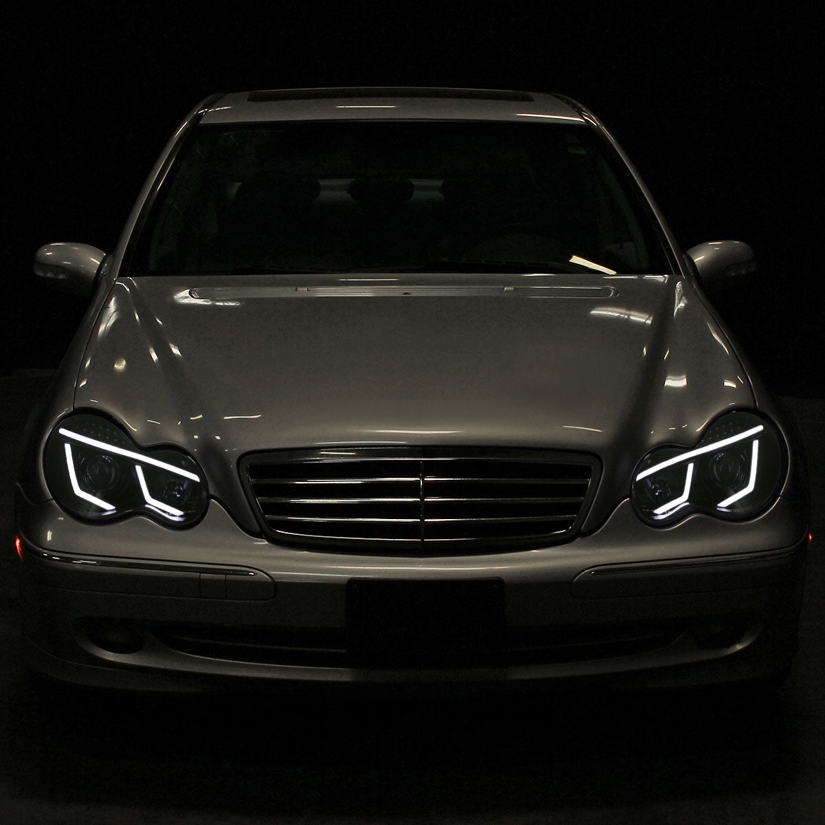 2001-2007 Mercedes Benz W203 C Class Sedan LED Bar Projector Headlights w/ LED Turn Signal Lights (Glossy Black Housing/Smoked Lens)