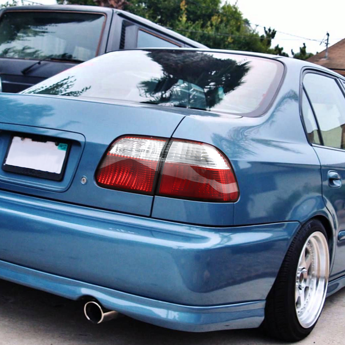 1999-2000 Honda Civic Sedan Tail Lights (Chrome Housing/Red Clear Lens)
