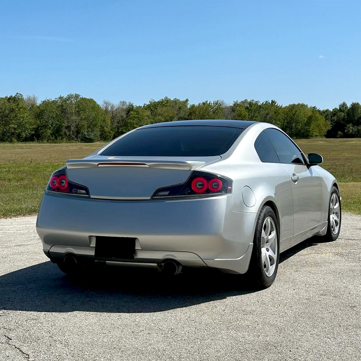 2003-2007 Infiniti G35 Coupe Red LED Halo Sequential Signal Tail Lights (Glossy Black Housing/Clear Lens)
