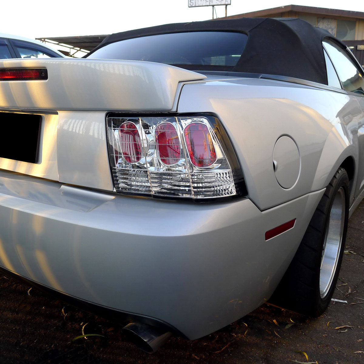 1999-2004 Ford Mustang Tail Lights (Chrome Housing/Clear Lens)