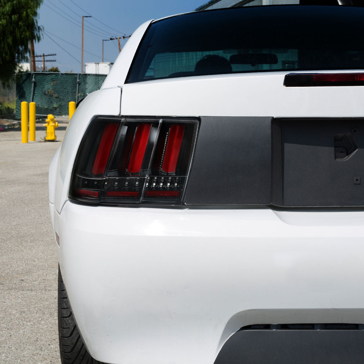 1999-2004 Ford Mustang Sequential LED Tail Lights (Jet Black Housing/Clear Lens)