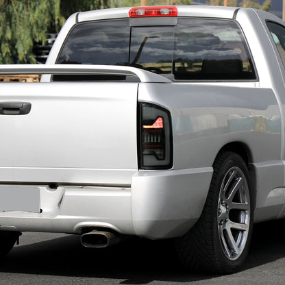 2002-2006 Dodge RAM 1500/2500/3500 White LED Bar Tail Lights (Matte Black Housing/Smoked Lens)