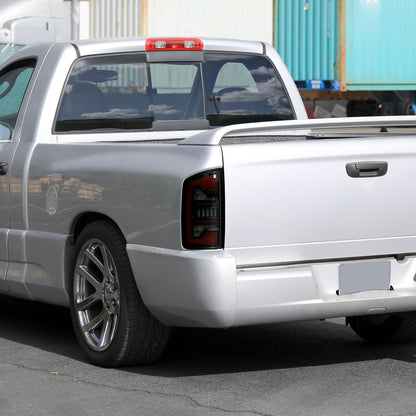 2002-2006 Dodge RAM 1500/2500/3500 Red LED Bar Tail Lights (Matte Black Housing/Smoked Lens)