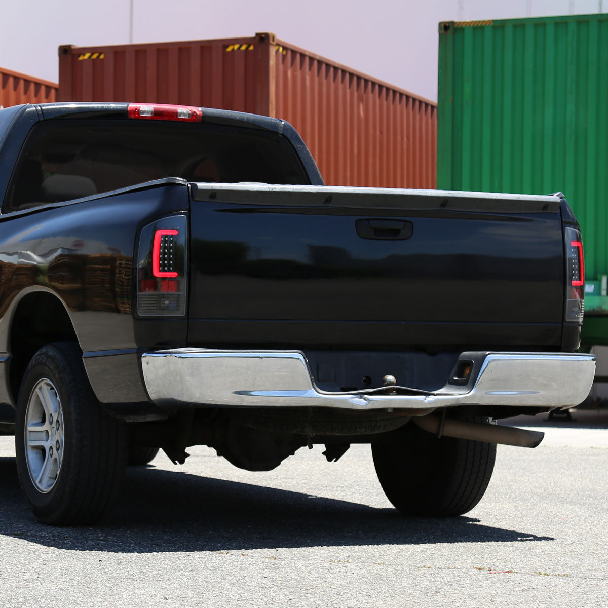 2007-2009 Dodge RAM 1500/2500/3500 Red C-Bar LED Tail Lights (Jet Black Housing/Clear Lens)
