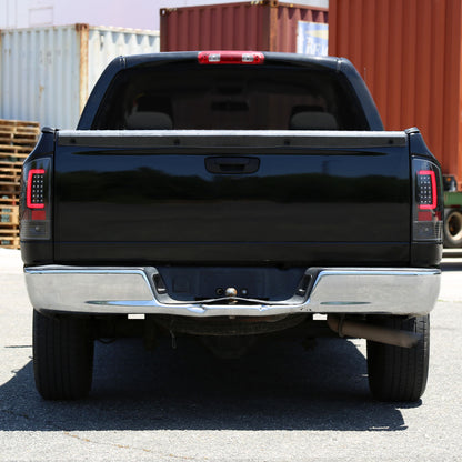 2007-2009 Dodge RAM 1500/2500/3500 Red C-Bar LED Tail Lights (Jet Black Housing/Clear Lens)