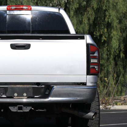 2007-2009 Dodge RAM 1500/2500/3500 Red LED Bar Tail Lights (Matte Black Housing/Clear Lens)