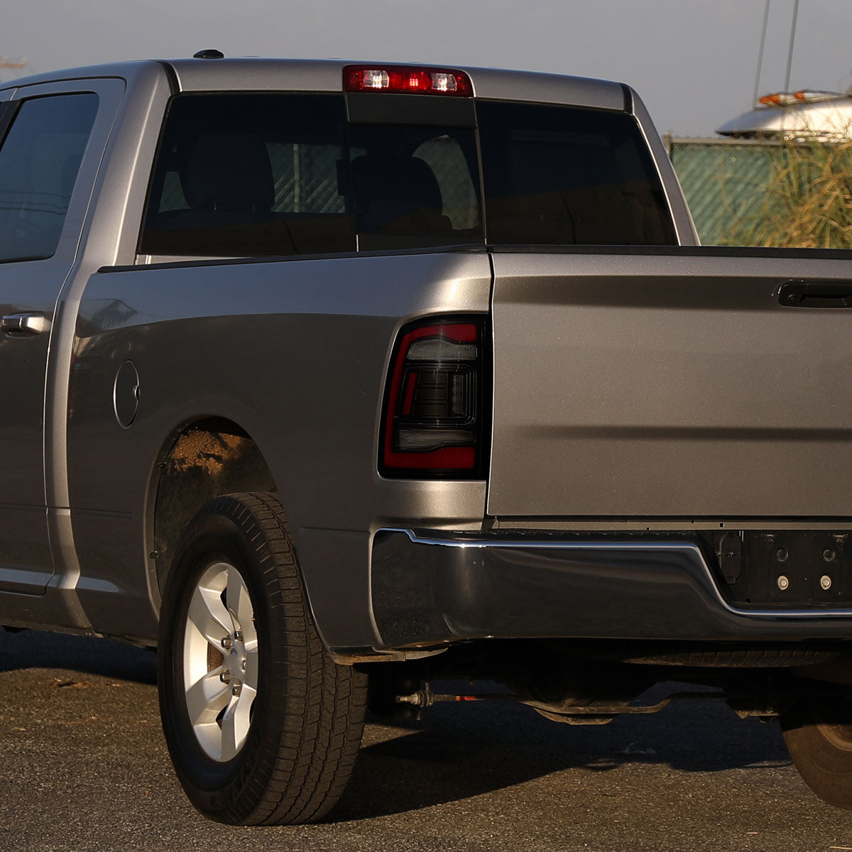 2009-2018 Dodge RAM 1500/2019-2022 RAM 1500 Classic/2010-2018 RAM 2500 3500 Red LED Bar Tail Lights (Matte Black Housing/Smoked Lens)