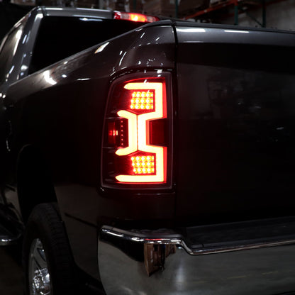 2019-2024 Dodge RAM 2500/3500 Red LED Bar Sequential Signal Tail Lights (Black Housing/Clear Lens)