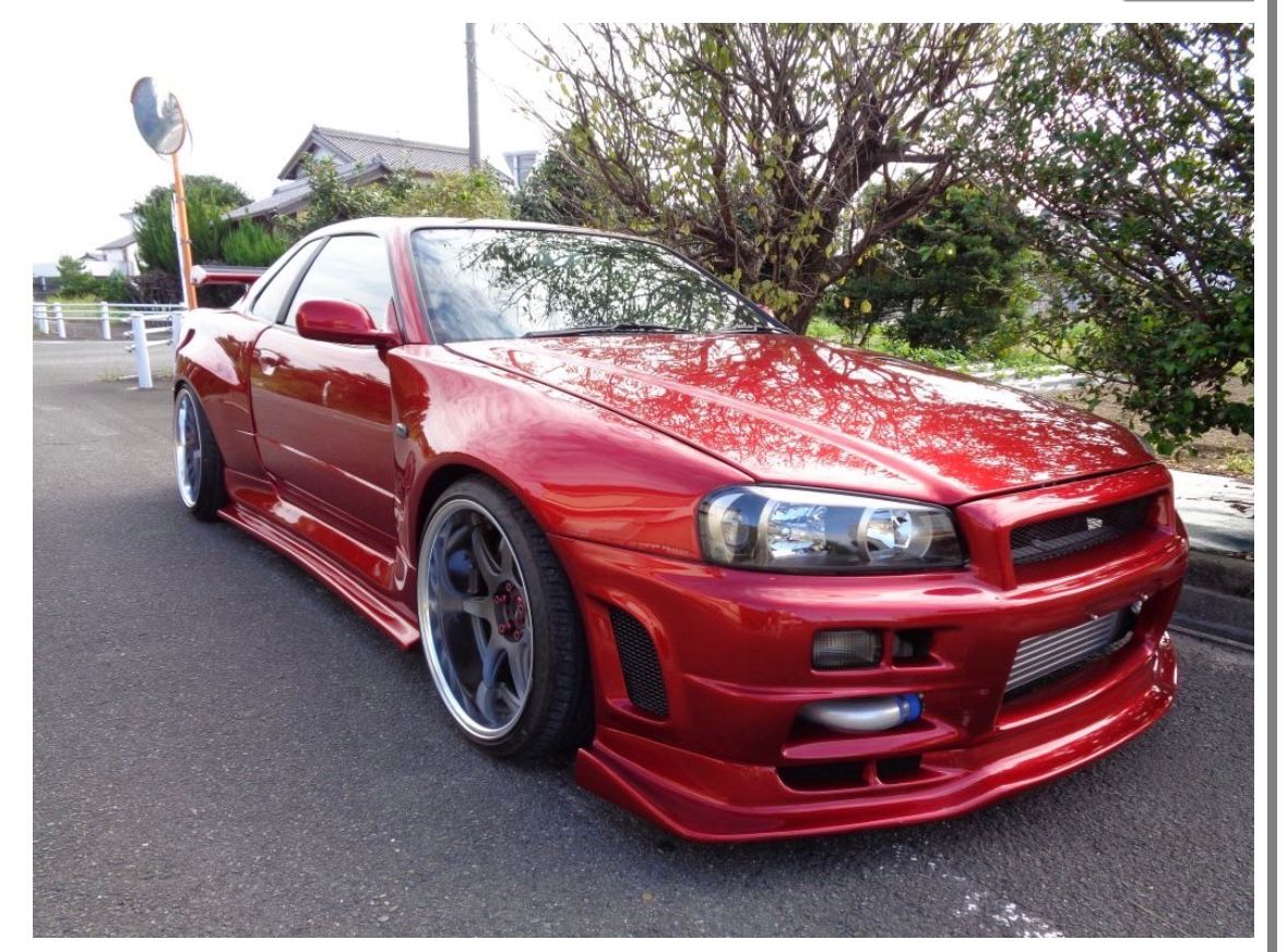 1998 Nissan Skyline R34 GTT Red Crystal Metallic
