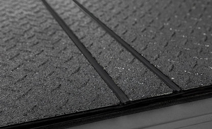 Access LOMAX Professional Series Tri-Fold Cover 04-18 Ford F-150 5ft 6in Short Bed Diamond Plate B0010019
