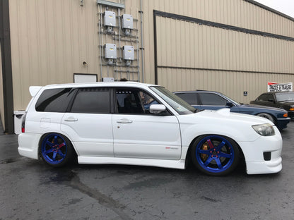 03-08 Forester window vents SG