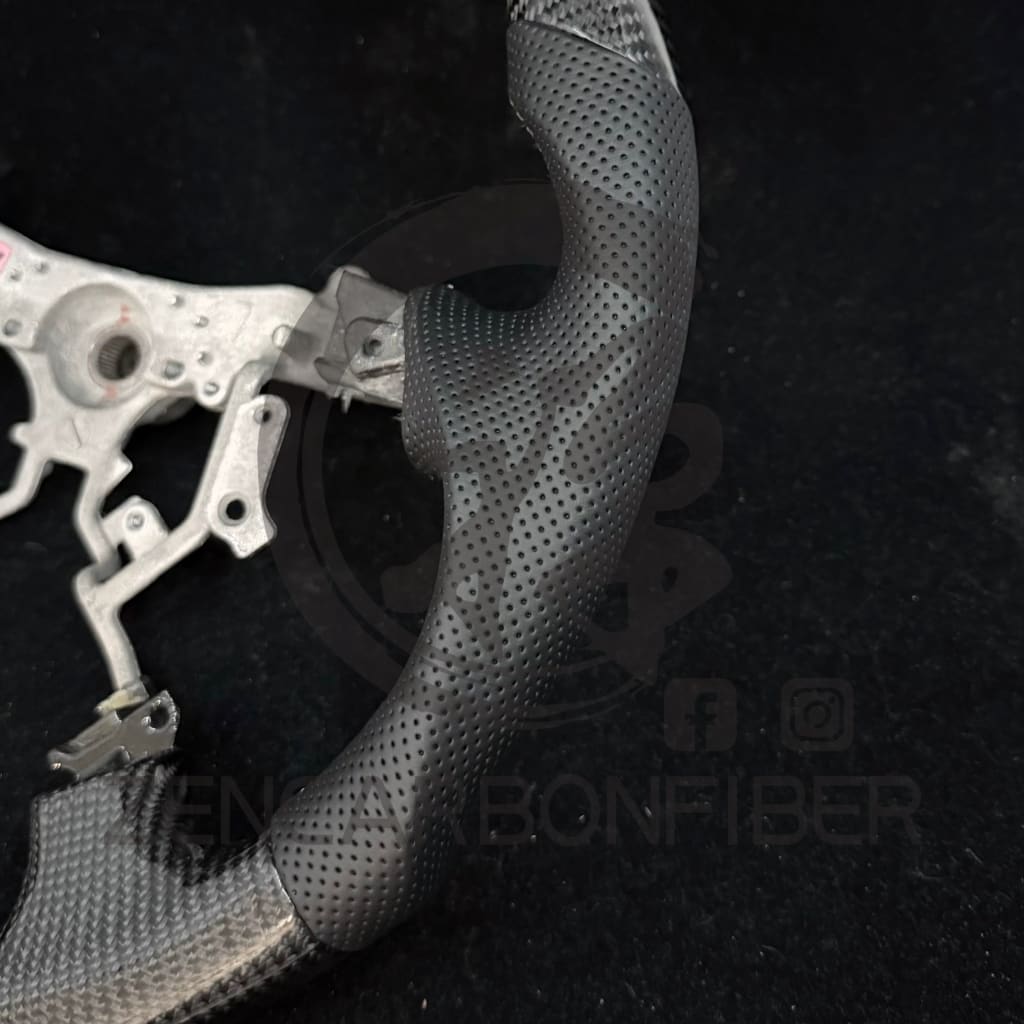 IN STOCK - 2003-2009 Toyota 4Runner/Tacoma Carbon Fiber Steering Wheel