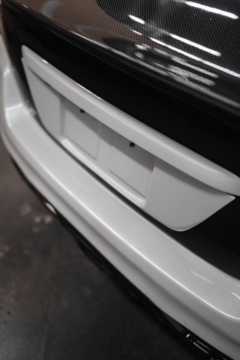 JDMuscle [15-21 WRX/STI] Gloss Black / Paint Matched License Plate Backing *CLEARANCE*NO RETURNS*